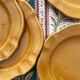 4 dessert plates in ceramic Pichon Uzes ochre yellow