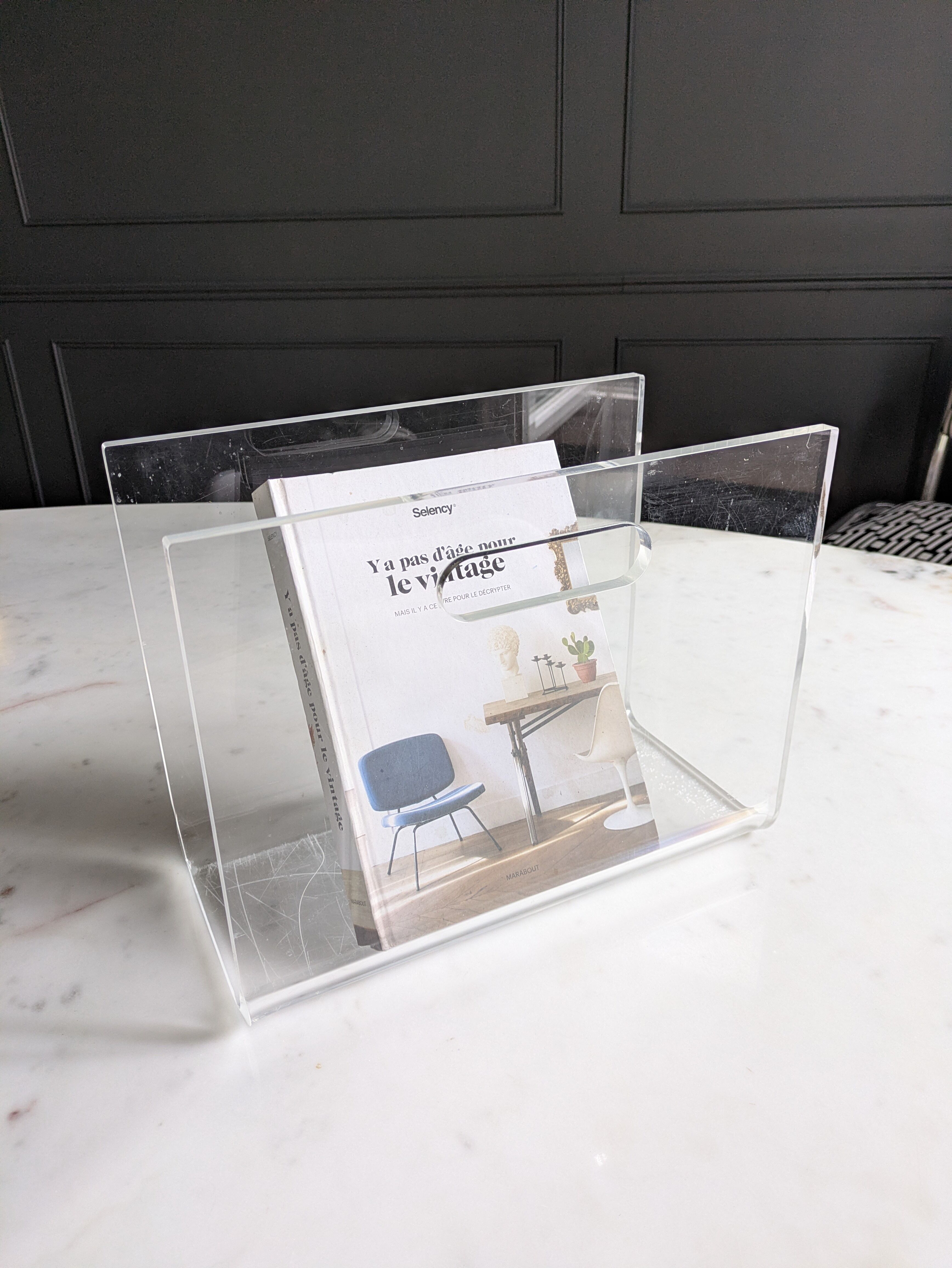 Plexiglass magazine rack by David Lange