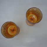2 amber glass foot glasses