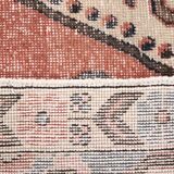 Tapis oriental vintage en laine, médaillon géométrique corail et bleu