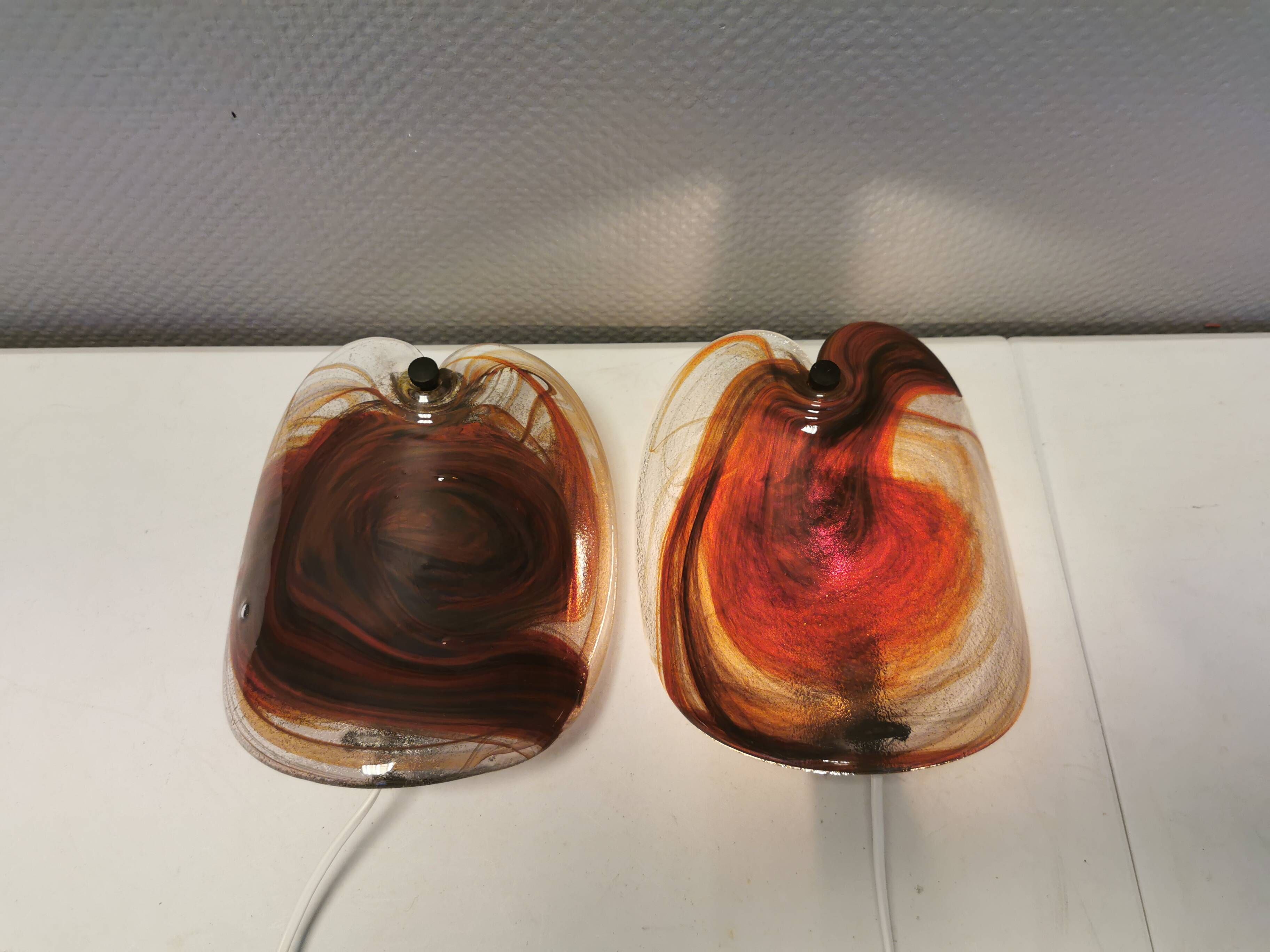 Two wonderfully crafted glass wall lamps designed by per lutken for holmegaard glassworks 1978