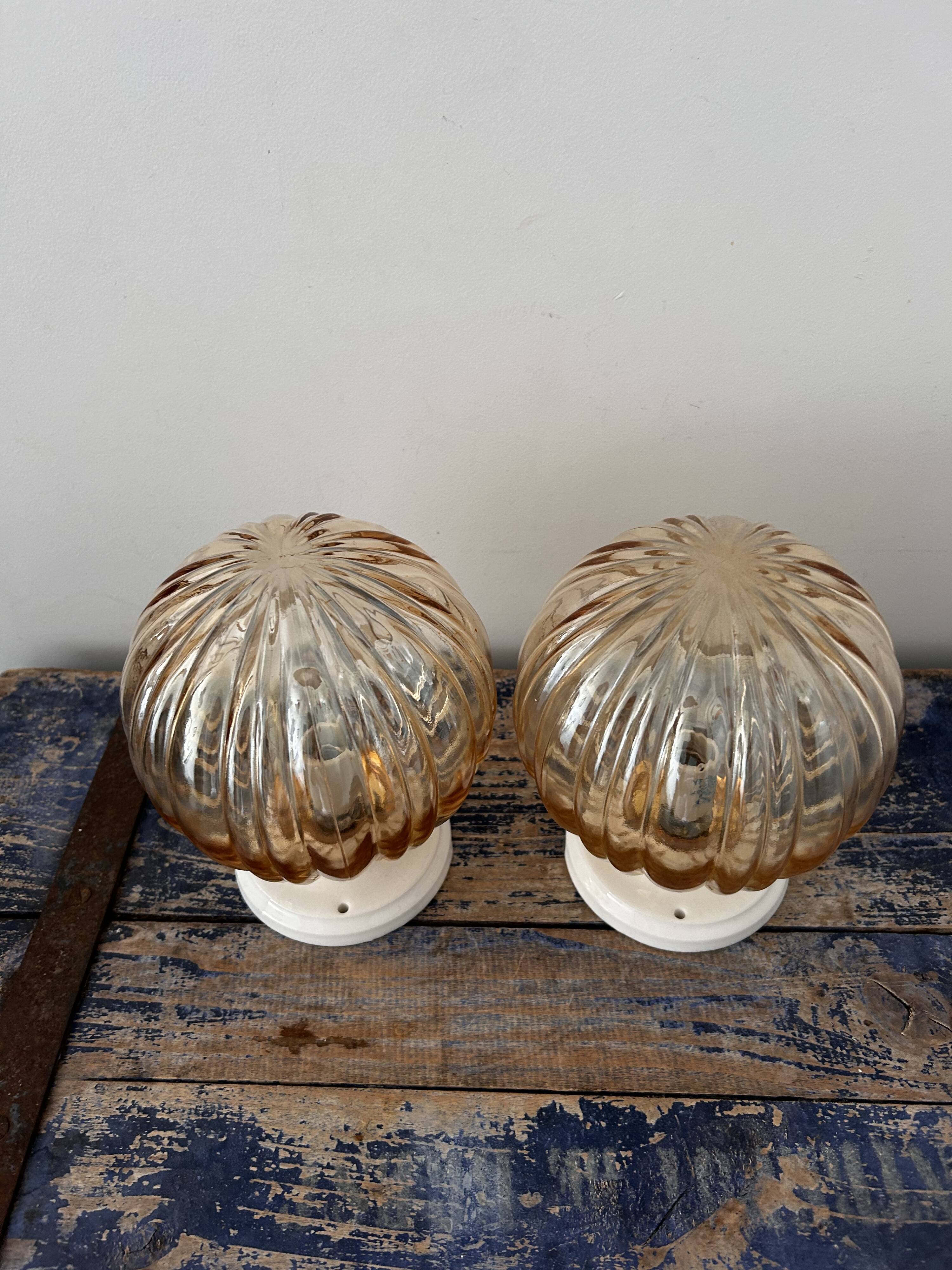 Pair of vintage golden globe wall or ceiling lights