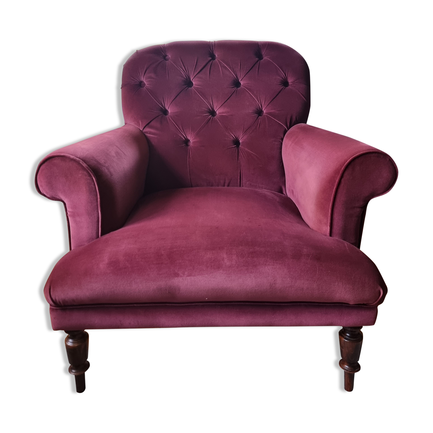 Upholstered velvet armchair
