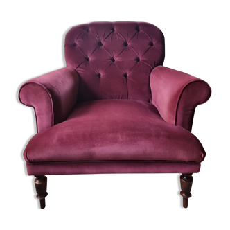 Upholstered velvet armchair