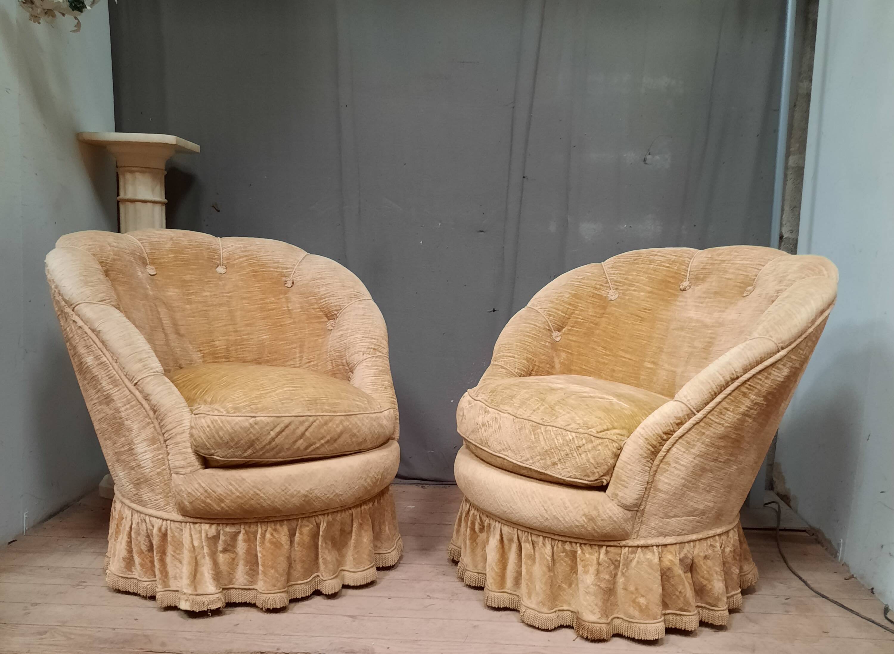 Pair of flared back toad armchairs