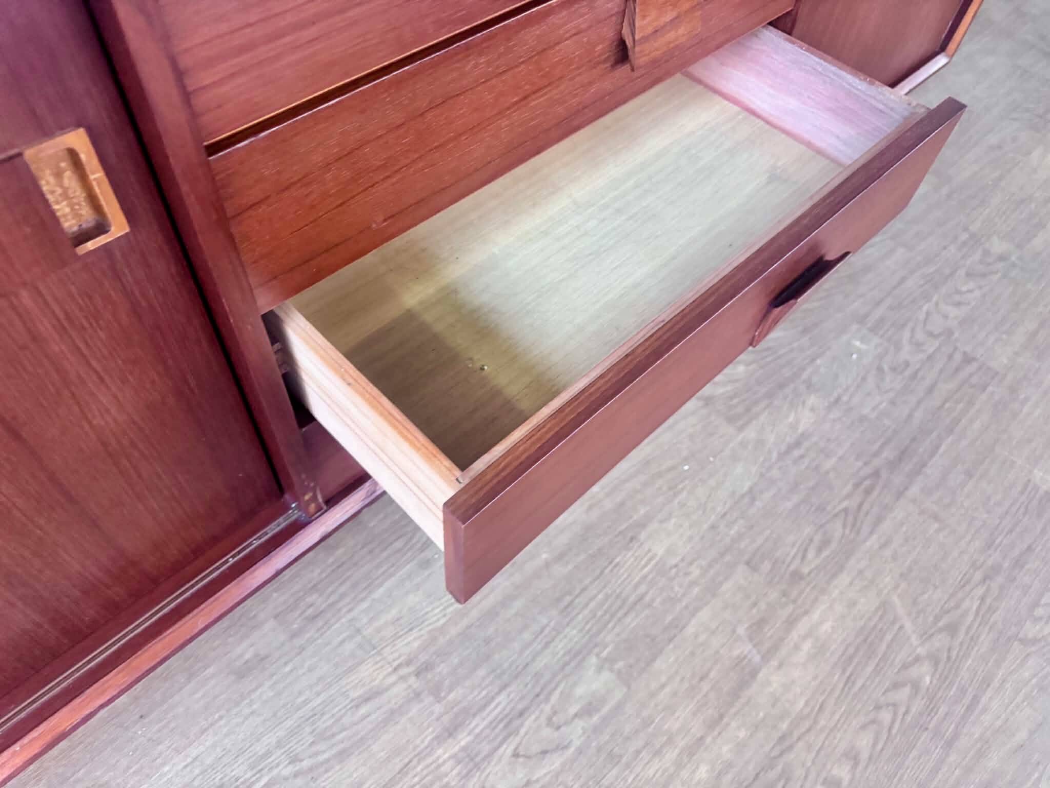 Scandinavian teak sideboard, 230 cm long, with 3 doors and 4 drawers.
