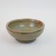 Small bowl in water green glazed ceramic with coral pink pattern