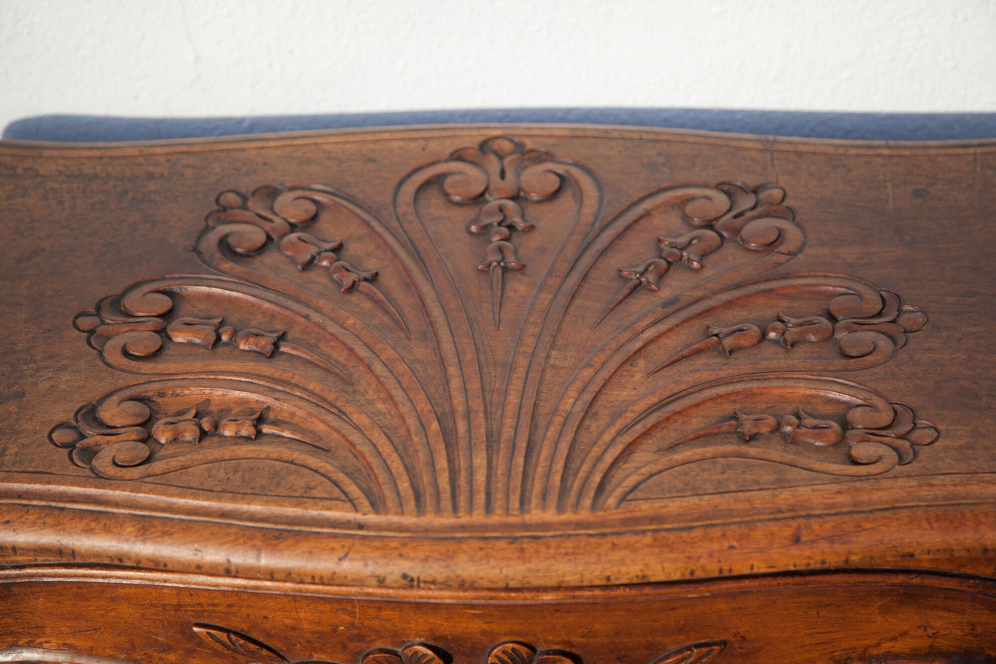 Old chest, carved wooden chest, curved chest on wheels, interior decoration