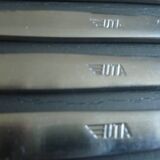 Set of 12 UTA stainless steel knives, vintage