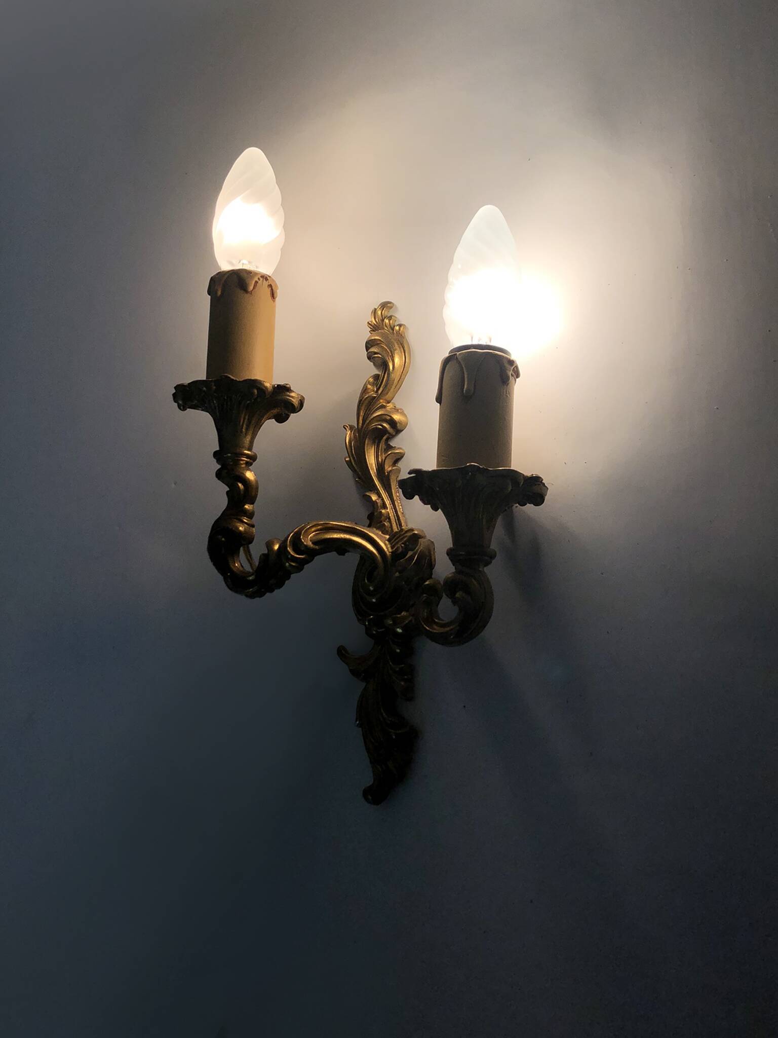 Antique pair of double-light brass wall sconces, 1960s