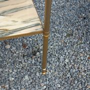 Pair of neoclassical side tables in bronze, brass, marble, and o.