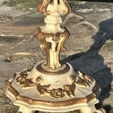 Carved and lacquered wooden side table.