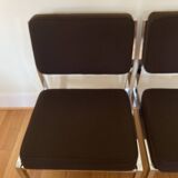 Pair of brown low chairs with chrome base