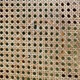 Set of four cane and webbing bar stools