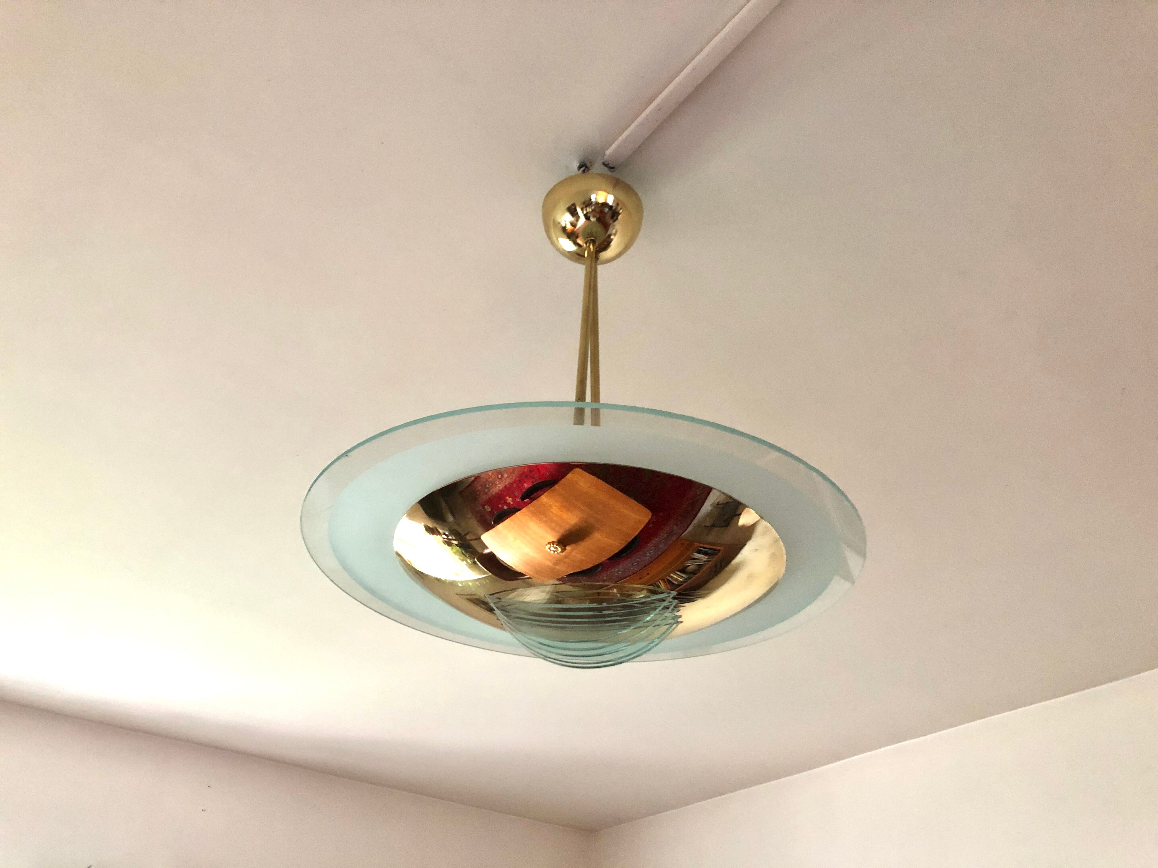 Suspension in gilded brass, Italian design from the 1970s.