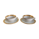 Pair of gold porcelain tea cups