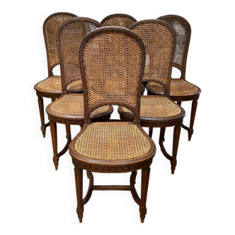 Set of six Louis XVI style chairs. Caned seats and backs.