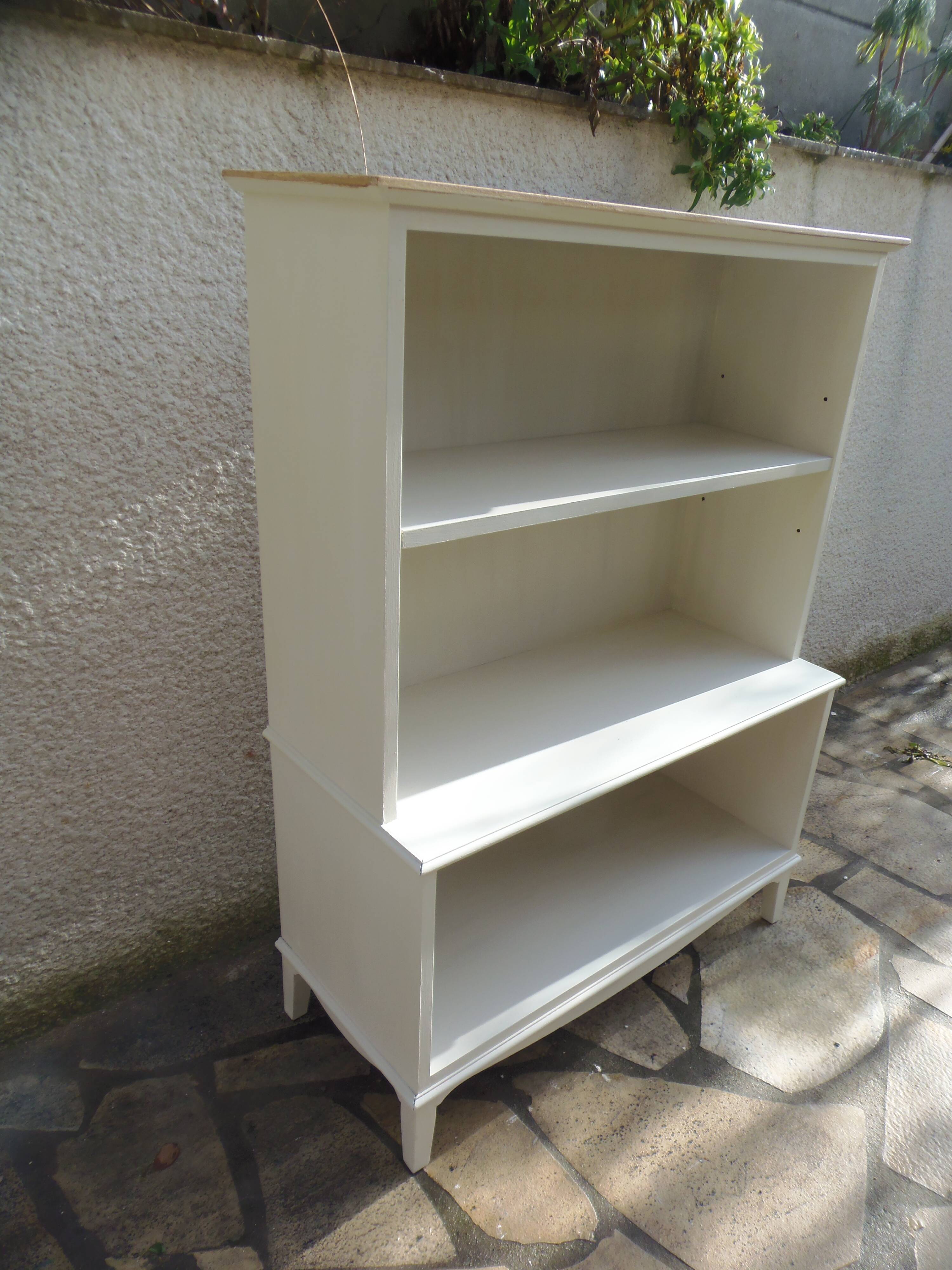 Vintage library enhanced in beige, wooden top.