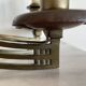 Art Nouveau style brass double piano wall lamp
