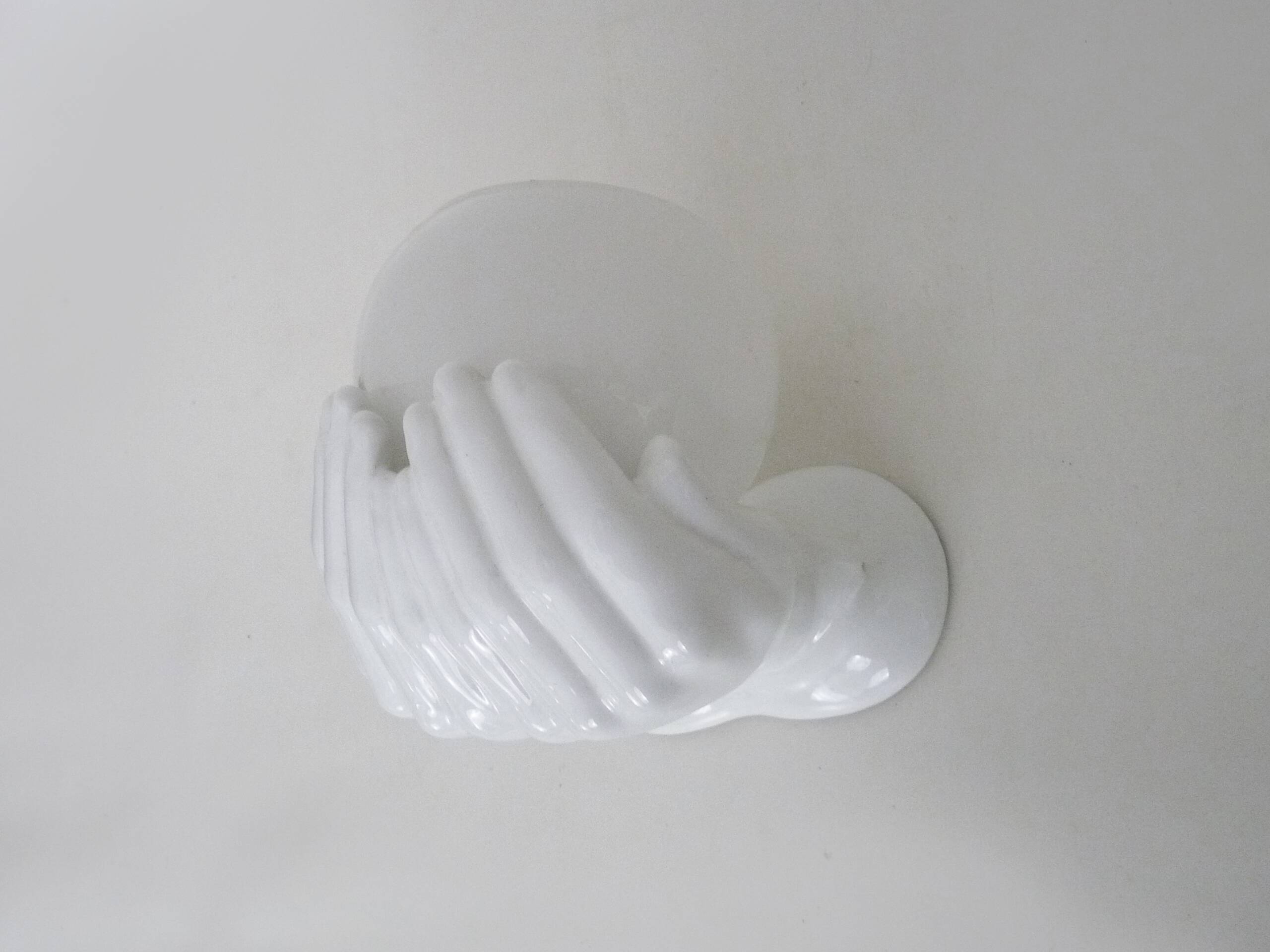 Ceramic pair of hands wall light from the 1970s.