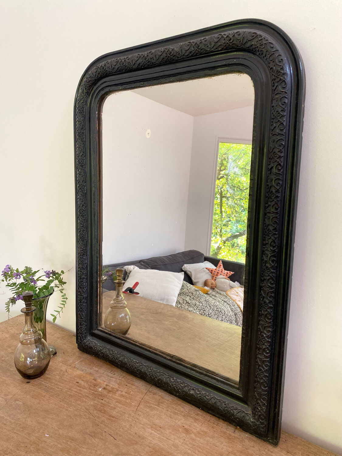 Louis Philippe period mirror with a plate repainted in black