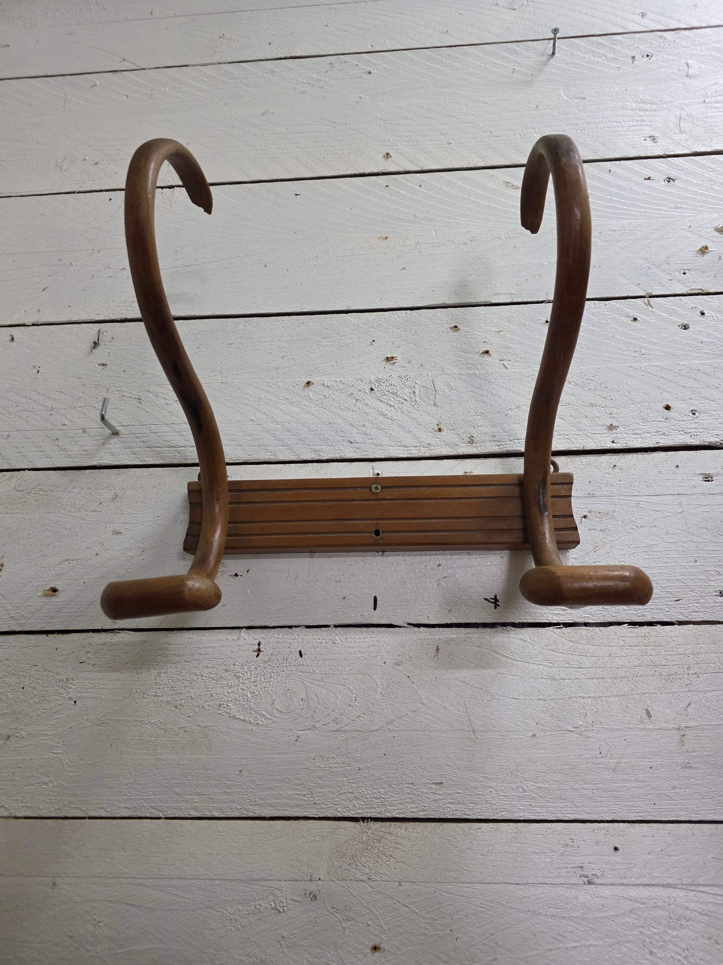 Curved wooden coat rack with 2 hooks, 1920s.