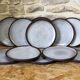 11 enameled stoneware dessert plates by Jeanne et Norbert Pierlot Ratilly