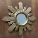Vintage sun mirror in 60s/70s gold resin