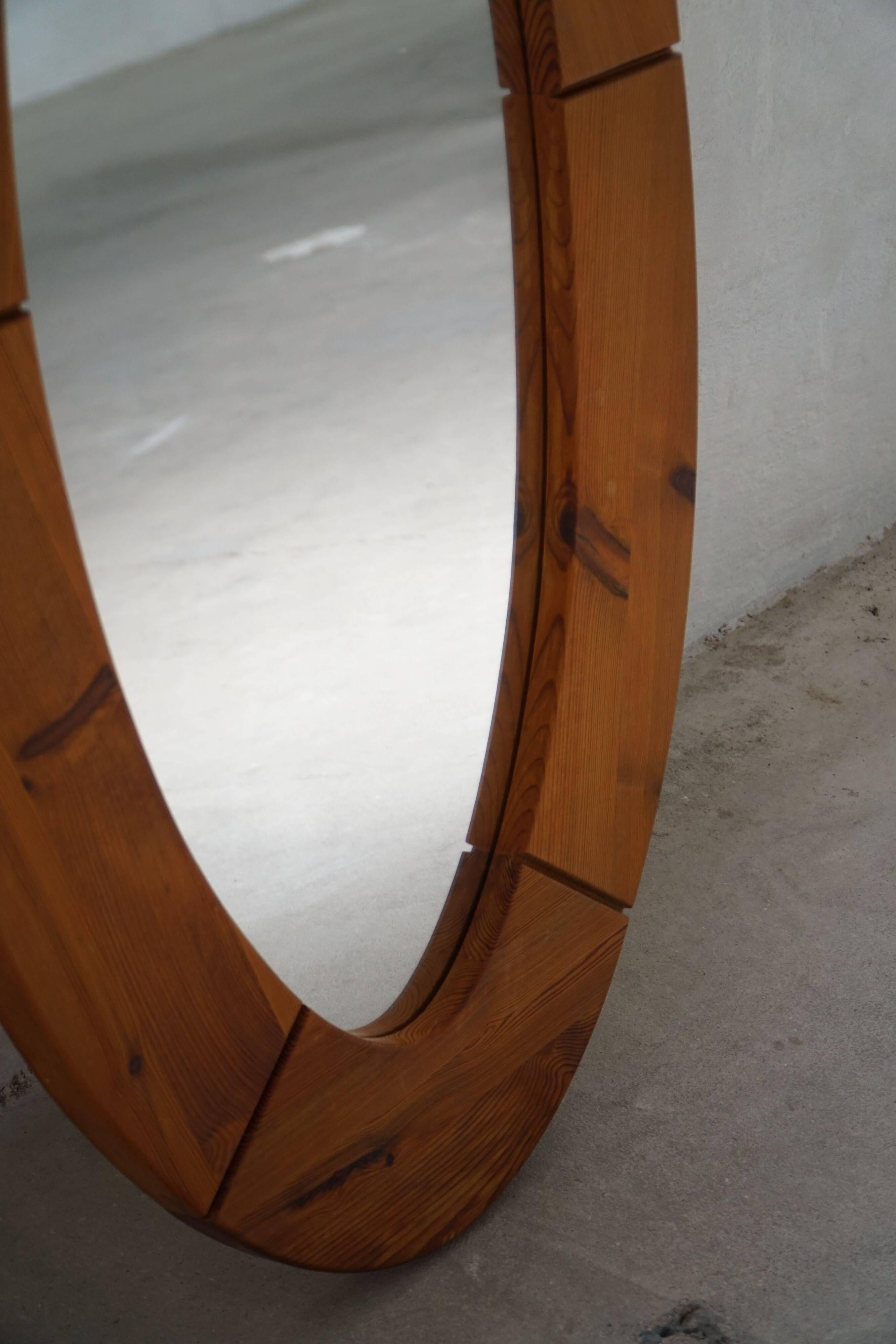 Large oval wall mirror in solid pine by Glasmäster Markaryd, Sweden, 1960s.