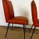 Pair of chairs in orange skaï