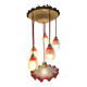 Suspension with tulips and a red scalloped lampshade.
