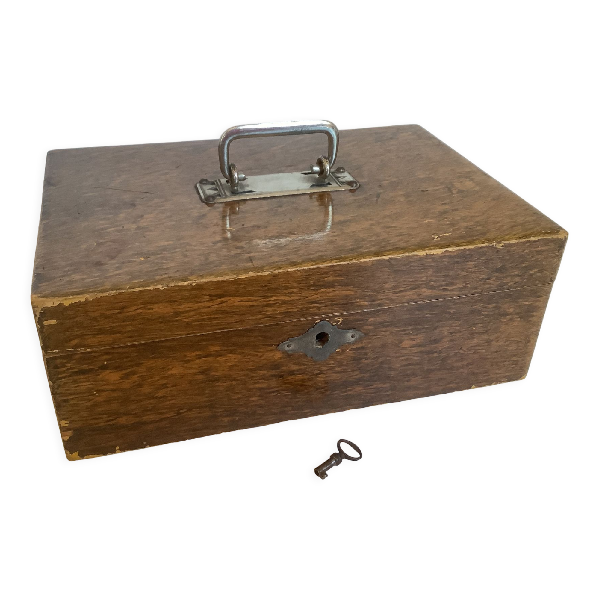Old wooden box with handle and metal keys