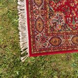 Old carpet in red wool