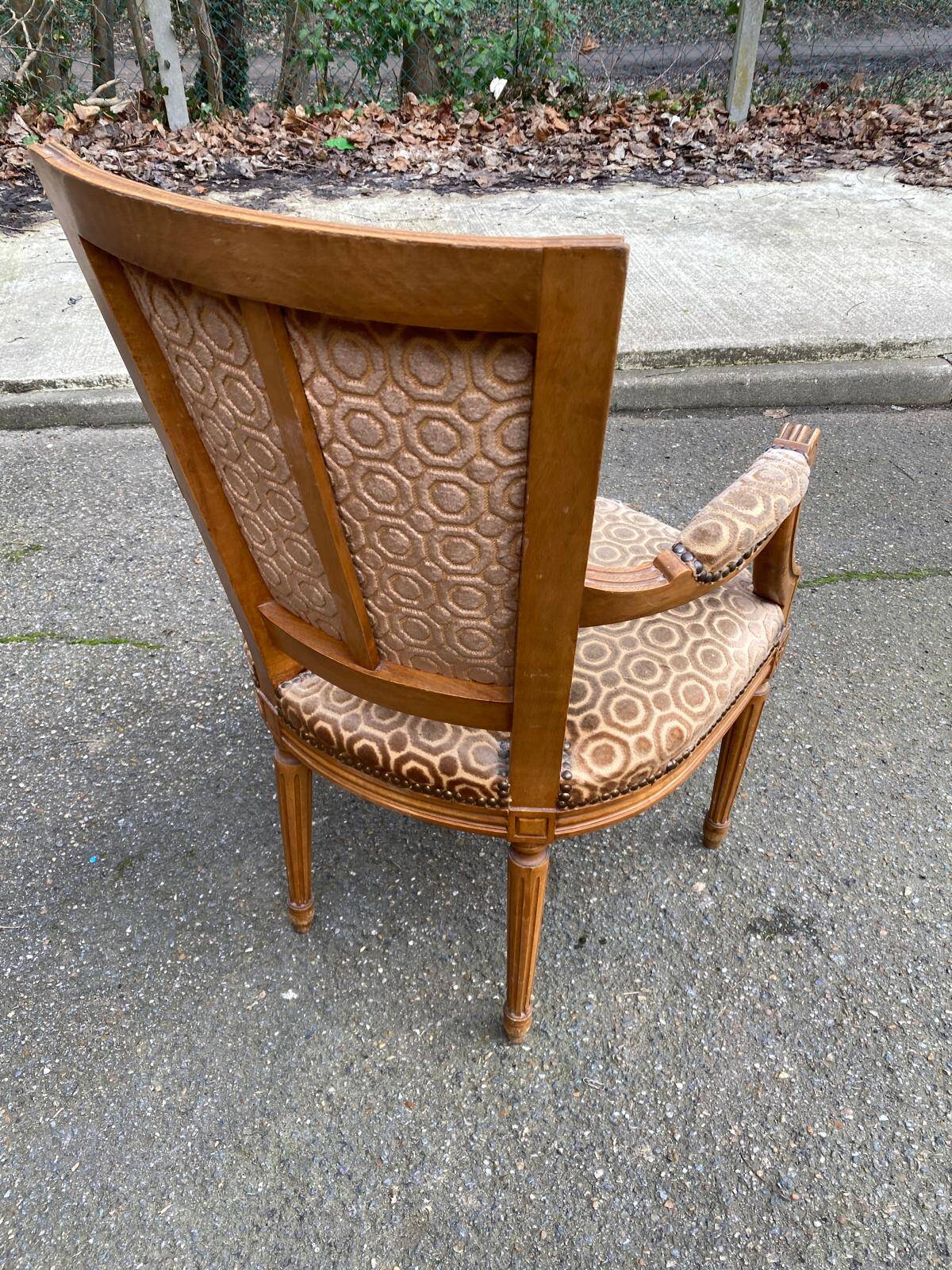 Solid wood and velvet armchair in Louis XVI style