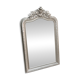 Large antique mirror from the late 19th century with a sculpted pediment in Louis Philippe style.