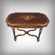 Middle table in rosewood veneer, Napoléon III period – 2nd half of the 19th century.