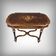 Middle table in rosewood veneer, Napoléon III period – 2nd half of the 19th century.