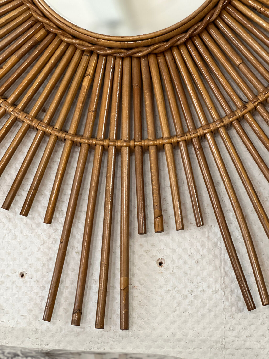Large sun mirror in rattan