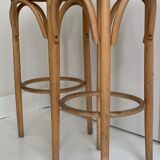 2 wooden and cane stools