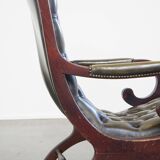 Green cow leather chesterfield armchair combined with wood