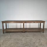 Beautiful 19th-century draper's table in oak with six fluted legs.