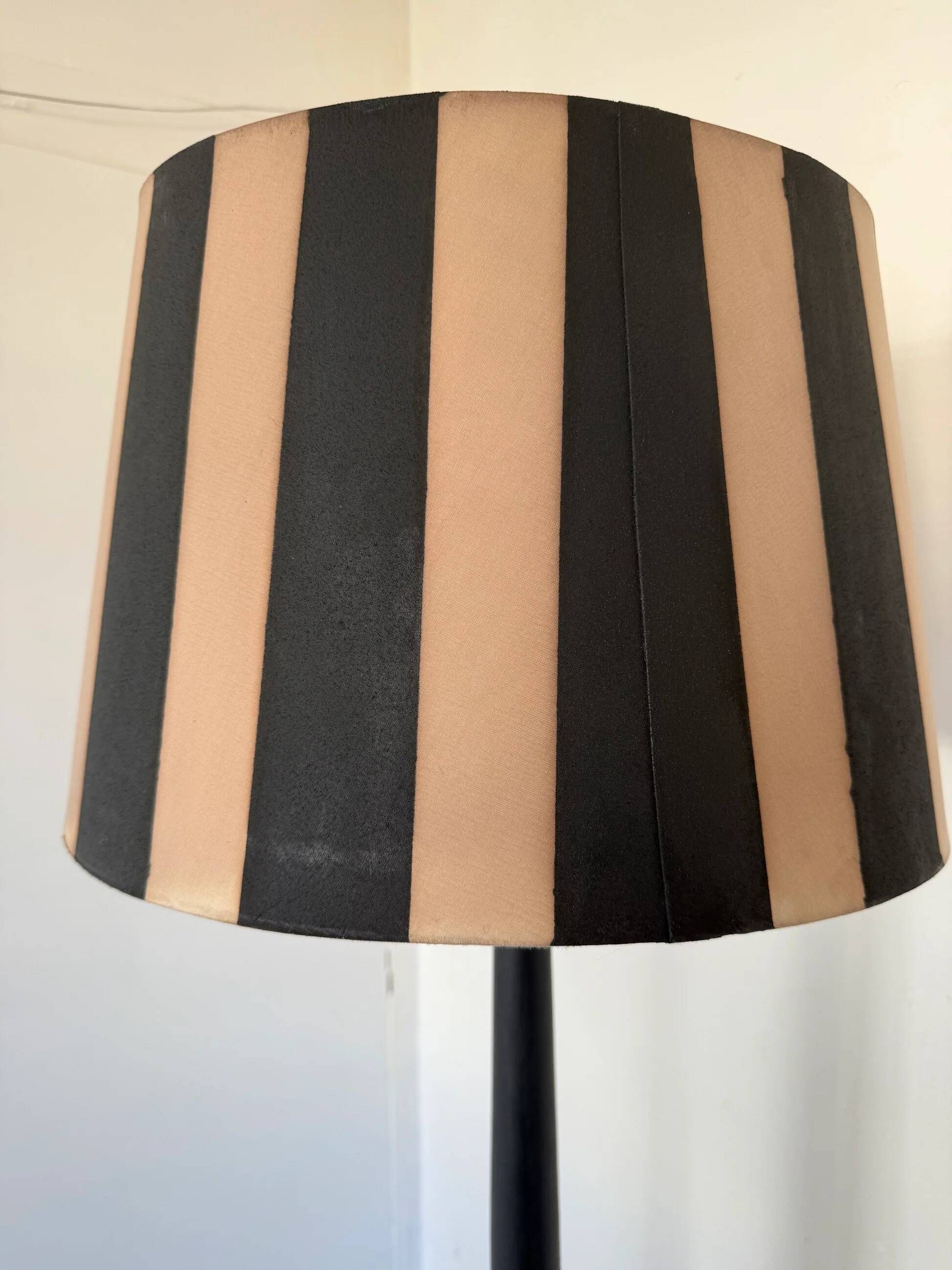 Vintage floor lamp in black patinated wood and striped lampshade