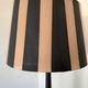 Vintage floor lamp in black patinated wood and striped lampshade