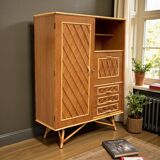 Rattan wardrobe with tapered legs from the 1960s.