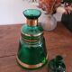 Green and gold glass carafe