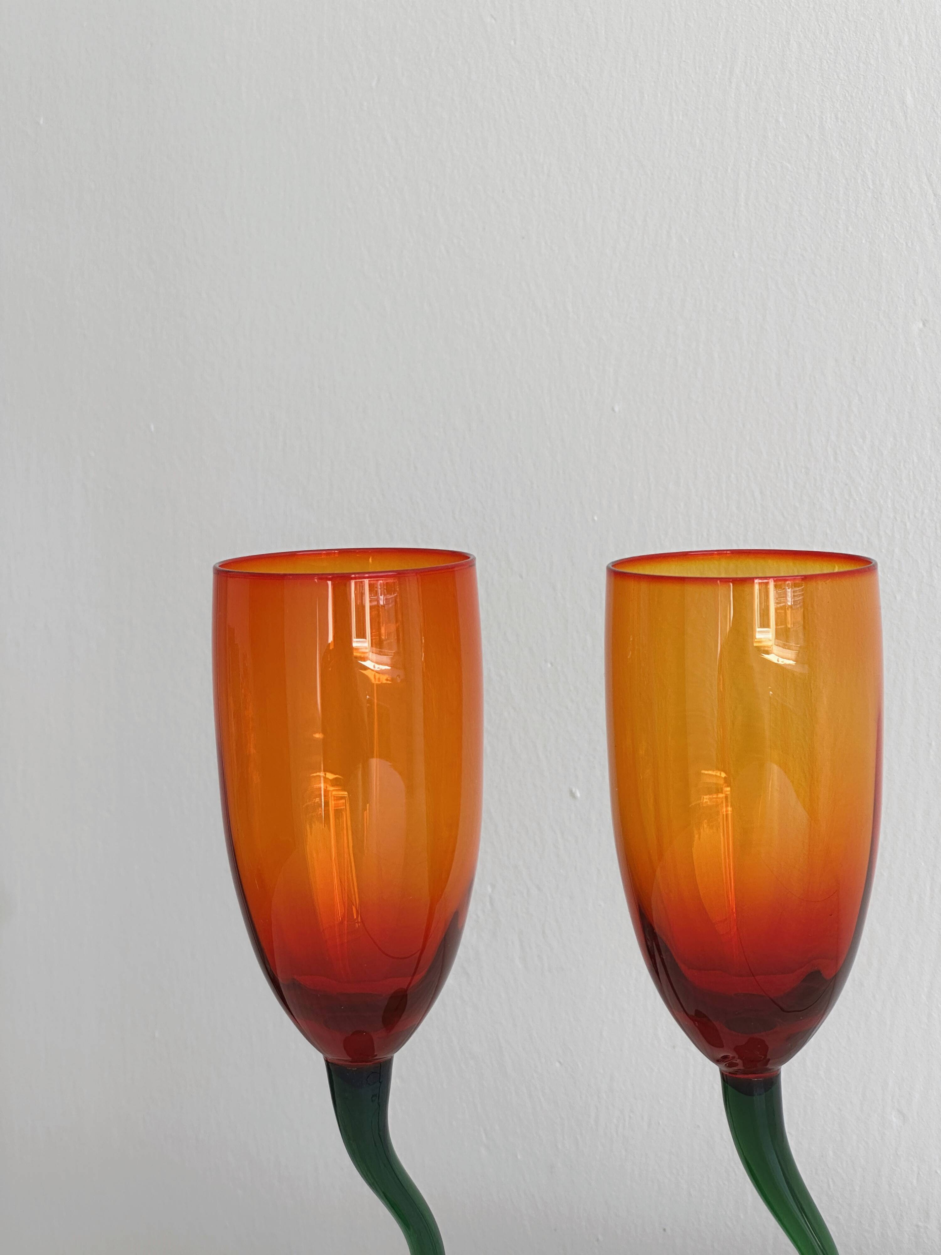 Pair of hand-blown orange glasses