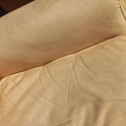 Pair of 1930s club armchairs in ivory leather.