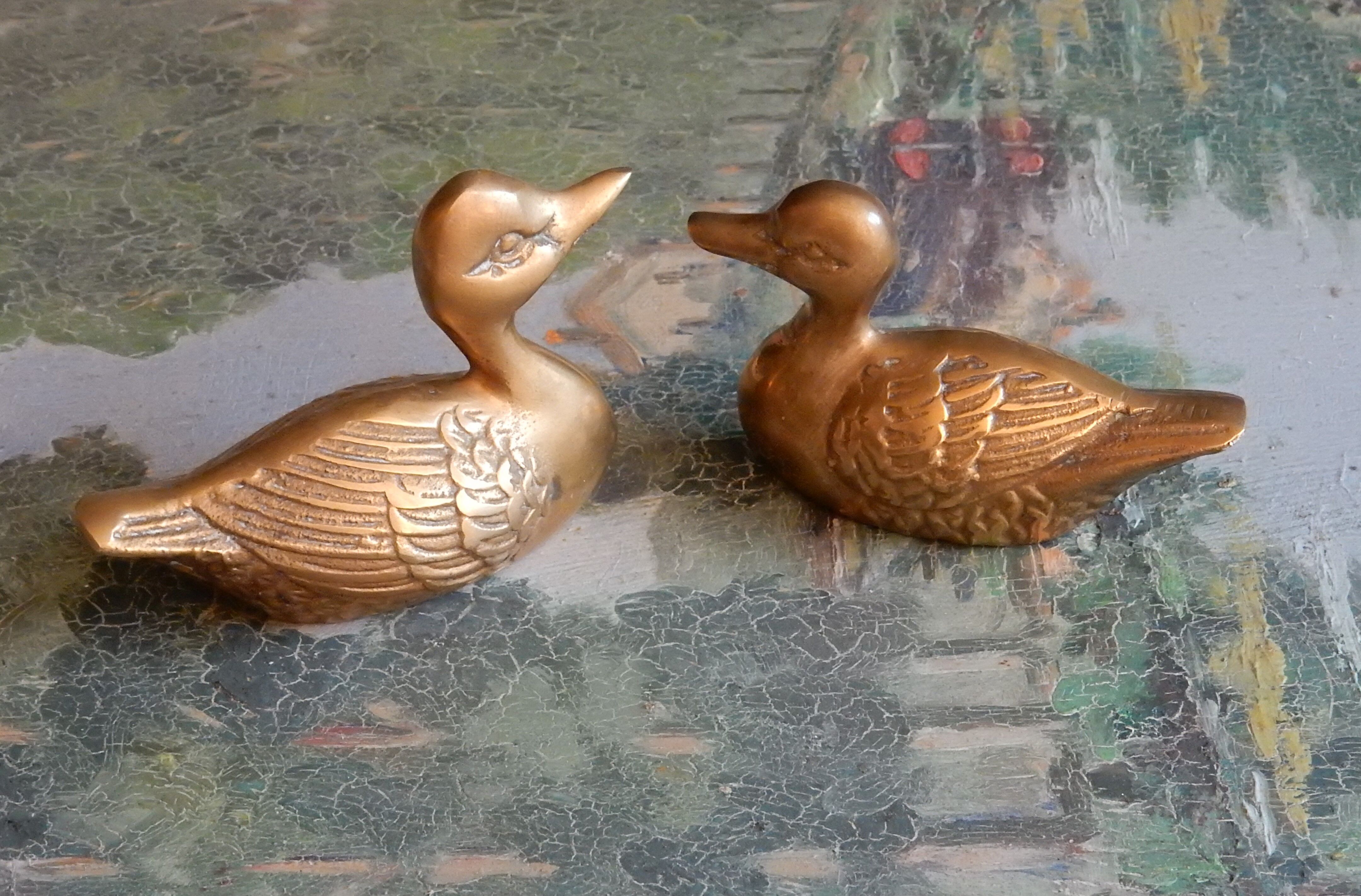 Couple of brass ducks