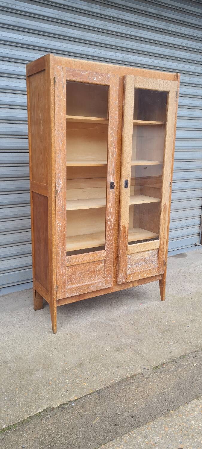 Armoire pied compas en chêne blond