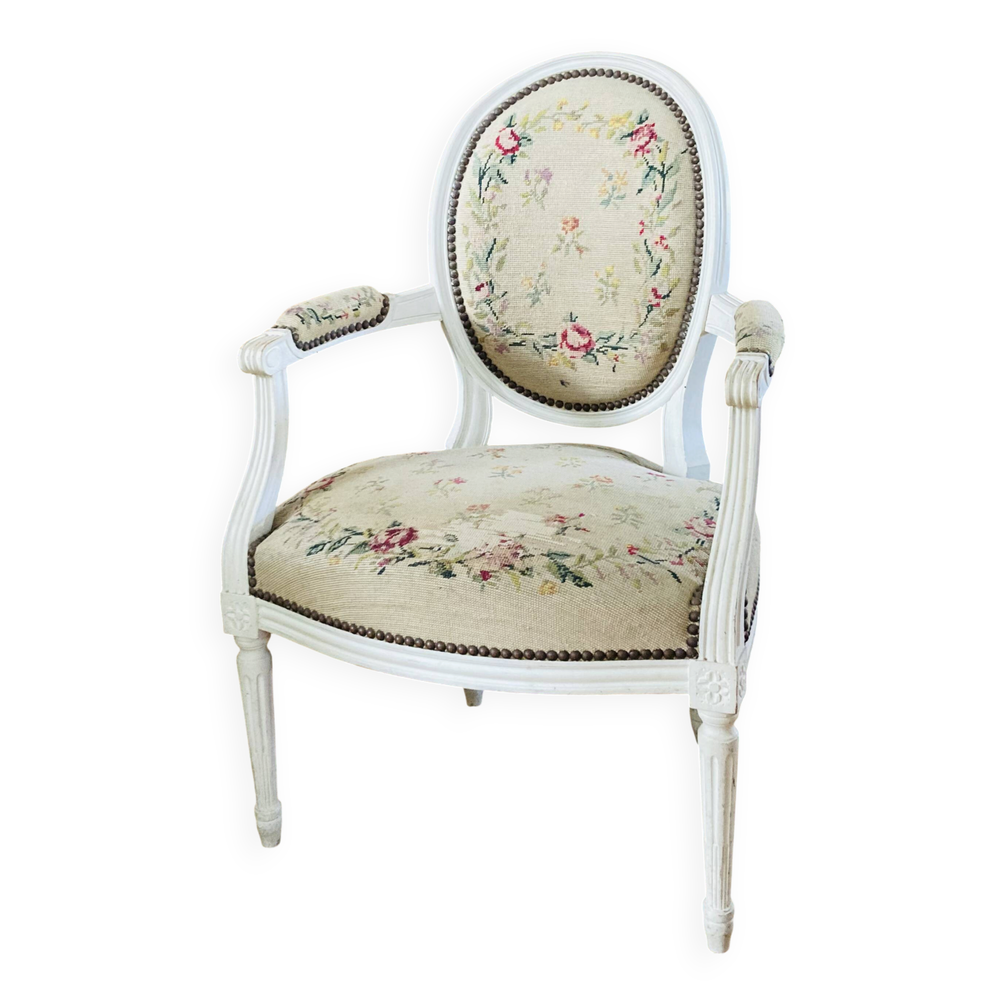 Upholstered armchair with cross-stitch in the Louis XVI style, 19th century.